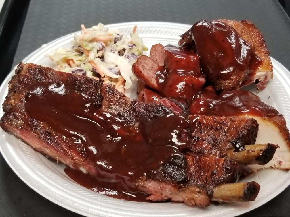 A Teague's BBQ plate — ribs, sausage and slaw